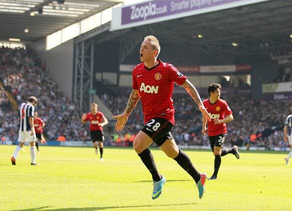Manchester United s Alex Buttner celebrates scoring his sides third goal - Barclays Premier League - West Bromwich Albion vs Manchester United - The Hawthrowns - West Bromwich - 19 05 2013 - Pic David Klein Sportimage EDITORIAL USE ONLY. No use with unauthorised audio, video, data, fixture lists, club league logos or live services. Online in-match use limited to 120 images, no video emulation. No use in betting, games or single club league player publications.