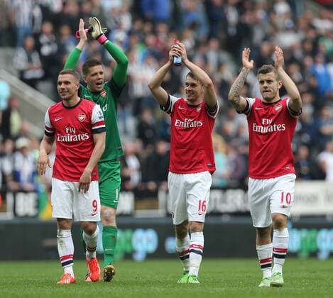 Lukas Podolski, Wojciech Szczesny, Aaron Ramsey and Jack Wilshere Football - English Premiership - Newcastle United v Arsenal FC Arsesnal player celebrates securing Champions League football during the Newcastle United v Arsenal FC , Barclay s Premier League football match at St James Park, Newcastle. Colorsport 19th May 2013 