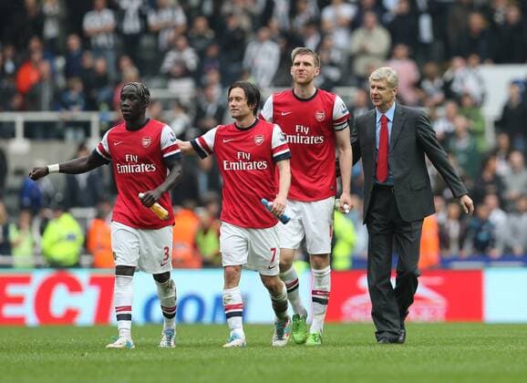 Bacary Sagna, Tomas Rosicky, Per Mertesacker, Arsene Wenger - Football - English Premiership - Newcastle United v Arsenal FC Arsesnal player celebrates securing Champions League football during the Newcastle United v Arsenal FC , Barclay s Premier League football match at St James Park, Newcastle. Colorsport 19th May 2013 