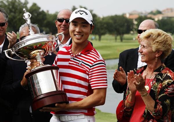 May 19, 2013: Sang-Moon Bae with winners trophy and Peggy Nelson the widow of the late Byron Nelson during the final round of the HP Byron Nelson Championship played at TPC Las Colinas Four Season Resort in Irving, TX. GOLF: MAY 19 PGA Golf Herren - HP Byron Nelson Championship - Final Round Icon1305190940 EDITORIAL USE ONLY