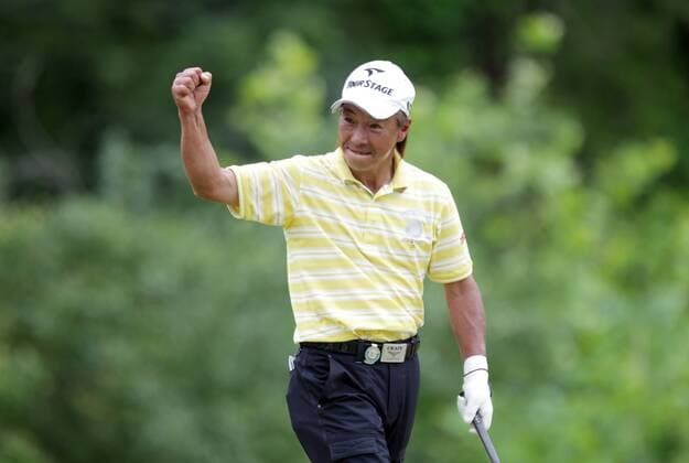Leader Kohki Idoki of Japan pumps his fist after sinking his putt for a birdie on 17 during the final round of the 74th Senior PGA Golf Herren Championship at Bellerive Country Club in St. Louis on May 26, 2013. Idoki won the tournament with an 11 under.  SLP2013052608