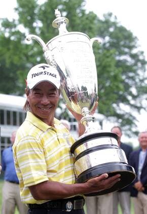 Kohki Idoki of Japan holds the Bourne Trophy after winning the 74th Senior PGA Golf Herren Championship at Bellerive Country Club in St. Louis on May 26, 2013. Idoki won the tournament with an 11 under.  SLP2013052610