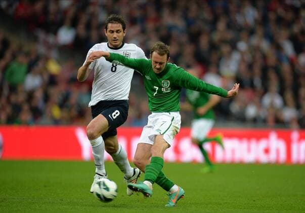 Aiden McGready of Ireland gets a shot away after dispossessing Frank Lampard of England - International Friendly - England vs Republic of Ireland - Wembley Stadium - London - England - 29 05 13 - Picture Simon Bellis Sportimage EDITORIAL USE ONLY. No use with unauthorised audio, video, data, fixture lists, club league logos or live services. Online in-match use limited to 120 images, no video emulation. No use in betting, games or single club league player publications.