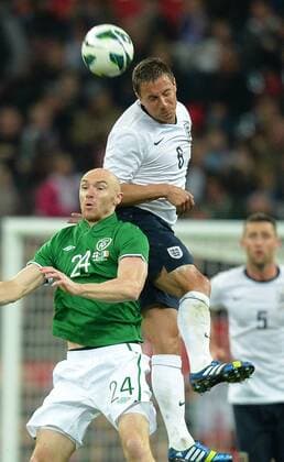 Phil Jagielka of England out jumps Conor Sammon of Ireland - International Friendly - England vs Republic of Ireland - Wembley Stadium - London - England - 29 05 13 - Picture Simon Bellis Sportimage EDITORIAL USE ONLY. No use with unauthorised audio, video, data, fixture lists, club league logos or live services. Online in-match use limited to 120 images, no video emulation. No use in betting, games or single club league player publications.