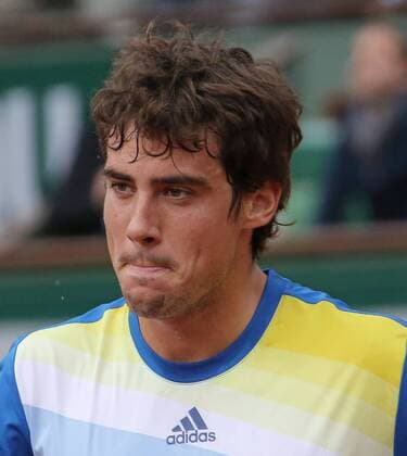 Guido Pella of Argentina reacts after shot during his French Open men s second round match at Roland Garros in Paris on May 30, 2013.  PAR20130530710