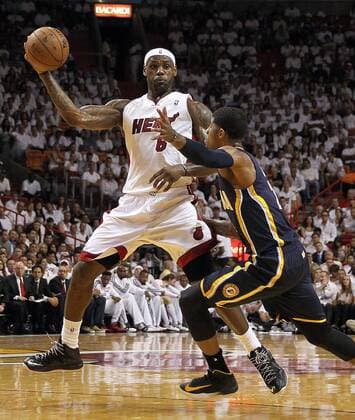 May 30, 2013 - Miami, FL, USA - The Miami Heat s LeBron James (6) passes the ball over the Indiana Pacers Paul George in the first quarter in Game 5 of the Eastern Conference finals on Thursday, May 30, 2013, at AmericanAirlines Arena in Miami, Florida. Game 5: Indiana at Miami - ZUMAm67