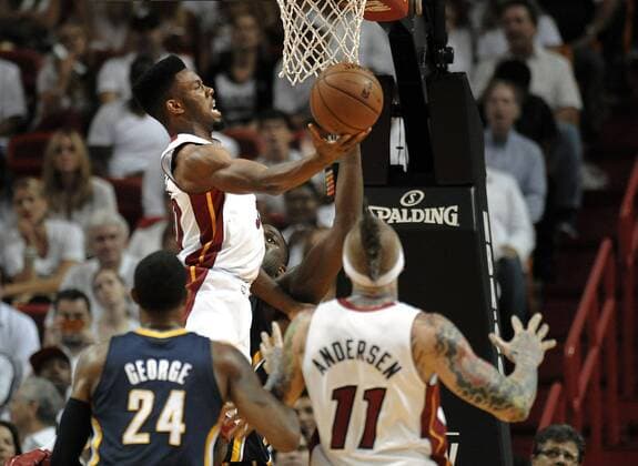 May 30, 2013 - Miami, FL, USA - The Miami Heat s Norris Cole drives the basket on the Indiana Pacers defense during the second quarter in Game 5 of the Eastern Conference finals on,Thursday, May 30, 2013, at AmericanAirlines Arena in Miami, Florida. Game 5: Indiana at Miami - ZUMAm67
