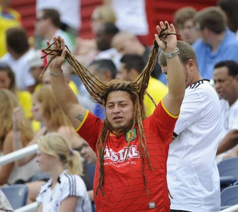 29 May 2013: Fans of the Ecuador National Team yell and wave flags in the stands during an international friendly soccer match at the FAU Stadium in Boca Raton, Florida. SOCCER Iwith 796130529037 EDITORIAL USE ONLY