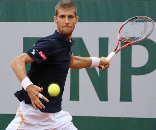 Martin Klizan of Slovakia hits a shot during his French Open men s second round match at Roland Garros in Paris on May 31, 2013.  PAR20130531703