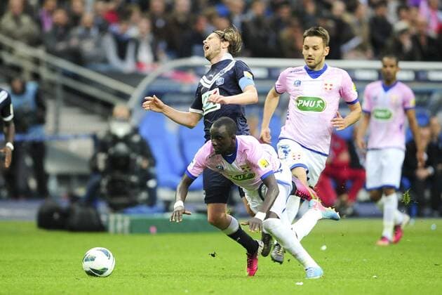 Mohammed Rabiu (Evian) vs Jaroslav Plasil (Bordeaux) FOOTBALL : Evian Thonon Gaillard vs Bordeaux - Finale coupe de France - 31 05 2013 JBAutissier Panoramic 