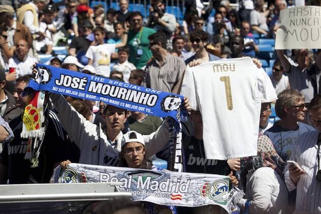 Football match Real Madrid fans with Jose Mourinho banners corresponding to the 38th day of the Spanish League, held at the Santiago Bernabeu stadium, in Madrid 06 01 2013. 