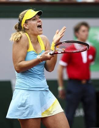 (130602) -- PARIS, June 2, 2013 (Xinhua) -- Angelique Kerber of Germany reacts during the women s singles fourth round match on day 8 of the 2013 French Open tennis tournament at Roland Garros in Paris, France, on June 2, 2013. (Xinhua Tang Shi) (jyc) (SP)FRANCE-PARIS-TENNIS-FRENCH OPEN 