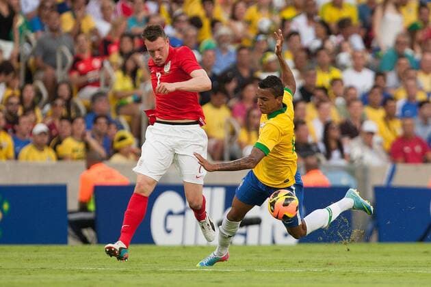Football - International Friendly - Brazil vs. England Phil Jones of England battles Luiz Gustavo of Brazil at the Maracana Stadium, Rio de Janeiro 