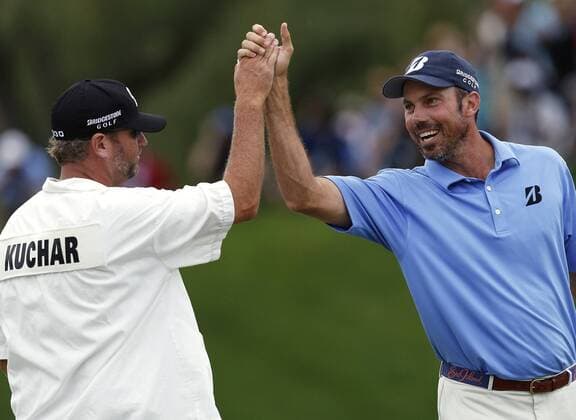 June 2, 2013 - Dublin, Ohio, U.S. - MATT KUCHAR high-fives his caddie LANCE BENNETT (L) after winning the Memorial Tournament at Muirfield Village Golf Club. Golf 2013 - Kuchar Wins The Memorial Tournament - ZUMAm67
