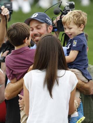 June 2, 2013 - Dublin, OH, USA - Matt Kuchar celebrates winning the Memorial Tournament with his family (wife Sybi son Cameron and son Carson) at Muirfield Village Golf Club in Dublin, Ohio, Sunday, June 2, 2013. 2013 Memorial Tournament - ZUMAm67