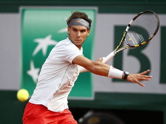 French Open 2013, Roland Garros,Paris,ITF Grand Slam Tennis Tournament, Rafael Nadal (ESP), Aktion,Einzelbild,Halbkoerper,Querformat,