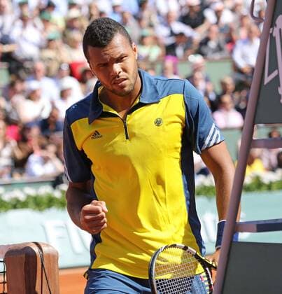 Jo-Wilfried Tsonga of France reacts after winning a game at Roland Garros in Paris on June 4, 2013.  PAR20130604708
