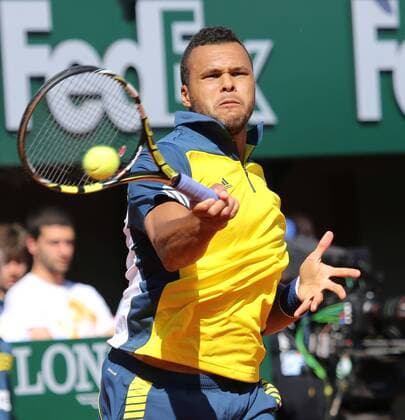 Jo-Wilfried Tsonga of France hits a shot at Roland Garros in Paris on June 4, 2013.  PAR20130604709