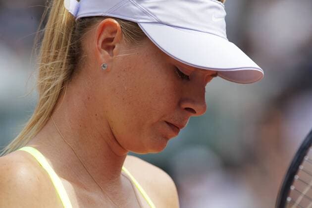 (130608) -- PARIS, June 8, 2013 (Xinhua) -- Maria Sharapova of Russia reacts during the women s singles final match at the French Open tennis tournament in Paris June 8, 2013. (Xinhua Gao Jing) (SP) FRANCE-PARIS-TENNIS-WOMEN S SINGLES FINAL 
