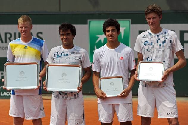 08.06.2013 Paris, France. Kyle Edmund of Great Britain and Frederico Ferreira Silva of Portugal and Christian Garin of Chile and Nicolas Jarry of Chile with their trophies after the Final of the Boys Doubles at the French Open from Roland Garros. Edmund of Great Britain and Silva won the title by a score of 6-3, 6-3. xDavidxEmmx  ActionPlus21647