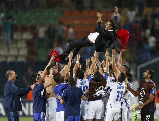 Israel s coach Guy Luzon gets thrown in the air by his players - Israel U21 vs England U21 - UEFA U21 Championship 2013 - Teddy Stadium - Jerusalem - Israel - 11 06 2013 - Pic David Klein Sportimage EDITORIAL USE ONLY. No use with unauthorised audio, video, data, fixture lists, club league logos or live services. Online in-match use limited to 120 images, no video emulation. No use in betting, games or single club league player publications.