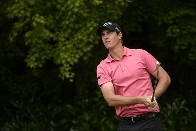 Nicolas Colsaerts watches his drive off of the 11th tee box during the first round of the 113th U.S. Open Championship at Merion Golf Club in Ardmore, Pennsylvania on June 12, 2013.  PHI20130613314