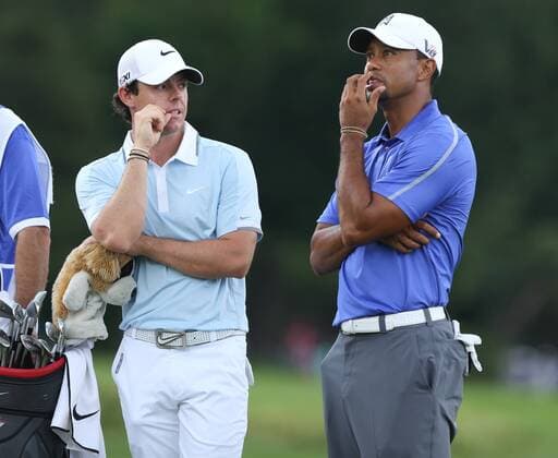 June 13 2013: Tiger Woods and Rory McIlroy talk while waiting to hit during the first round at the 2013 U.S. Open hosted by Merion Golf Club in Ardmore, PA. GOLF: JUN 13 PGA Golf Herren - U.S. Open - First Round Icon1306130981 EDITORIAL USE ONLY