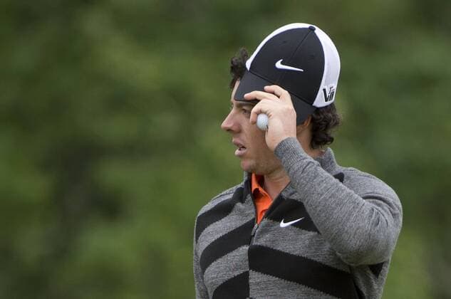 Rory McIlroy takes his hat off after finishing his first round of the 113th U.S. Open Championship at Merion Golf Club in Ardmore, Pennsylvania on June 14, 2013.  PHI20130614305