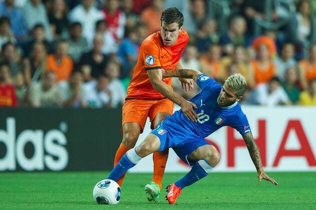(L-R) Kevin Strootman of Holland U21, Lorenzo Insigne of Italy U21 during the UEFA EURO U21 championship semi-final match between Italy and Netherlands on June 15, 2013 at the HaMoshava stadium at Petach Tikva, Israel. Italy U21 v Holland U21 UEFA EURO U21 2012 2013 xVIxxIVx 1608358