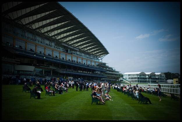 Racegoer s wait for the racing to start at Royal Ascot Day 2-Racing Fans Ascot, United Kingdom Wednesday, 19th June 2013 Picture by Andrew Parsons i-Images AndrewxParsonsx xi-Images  IIM-0119-0034