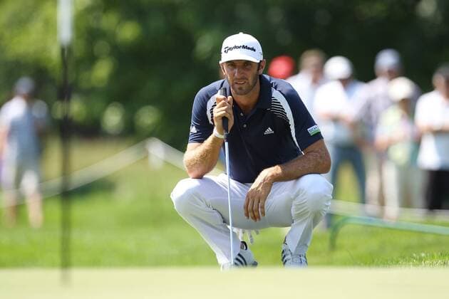 Dustin JOHNSON (USA) beim lesen der Puttlinie EP_ckt