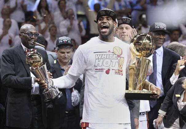 June 20, 2013 - Miami, FL, USA - LeBron James, the series MVP< holds trophies after a 95-88 win against the San Antonio Spurs in Game 7 of the NBA Basketball Herren USA Finals at the AmericanAirlines Arena in Miami, Florida, on Thursday, June 20, 2013. Game 7 of the NBA Basketball Herren USA Finals: San Antonio at Miami - ZUMAm67