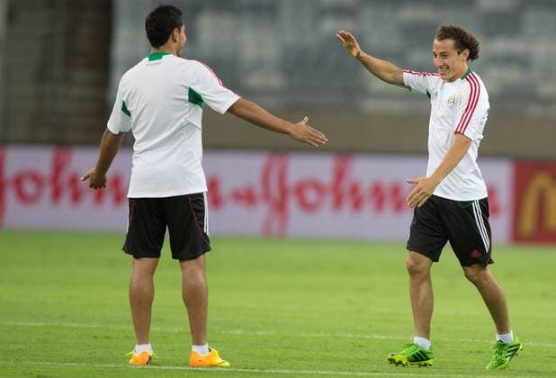 BELO HORIZONTE, June 21, 2013 -- Mexico s Pablo Barrera (L) and Andres Guardado attend a training session at the Mineirao Stadium in Belo Horizonte, Brazil, on June 21, 2013. Mexico will face Japan on Saturday in its third match of the FIFA Confederations Cup Brazil 2013. (Xinhua David de la Paz) (itm) (SP)BRAZIL-BELO HORIZONTE-CONFEDERATIONS-MEXICO 