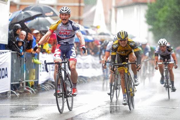 Andre GREIPEL ( GER Lotto - Belisol ) gewinnt zum ersten Mal die Deutsche Meisterschaft der Strassenfahrer - dahinter und Zweiter wird Gerald CIOLEK ( GER MTN Qhubeka ) - Jubel - Freude - Emotionen - Aktion - quer - Event: Deutsche Meisterschaften 2013 - Strassenrennen der Männer Elite 2013 - Location: Deutschland - Wangen - Baden Württemberg - Europa - Datum: 23.06.2013