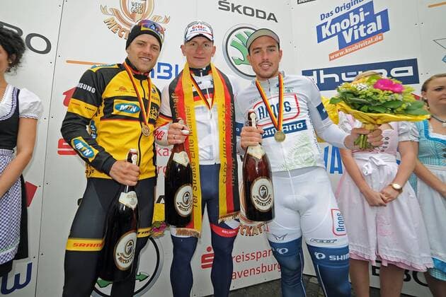 Podium v.l.n.r. - (2.) Gerald CIOLEK ( GER MTN Qhubeka ) - (1.) Andre GREIPEL ( GER Lotto - Belisol ) - (3.) John DEGENKOLB ( GER Argis Shimano ) - Jubel - Freude - Emotionen - Aktion - quer - Event: Deutsche Meisterschaften 2013 - Strassenrennen der Männer Elite 2013 - Location: Deutschland - Wangen - Baden Württemberg - Europa - Datum: 23.06.2013
