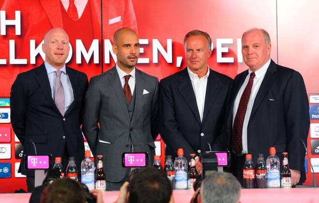 24.06.2013 --- Vorstellung des neuen Bayern-Trainers Pep Guardiola in der Allianz Arena München. V.l.n.r.: Sportdirektor Matthias SAMMER (FC Bayern München), Trainer Pep Guardiola (FC Bayern München), Vorstandsvorsitzender Karl-Heinz RUMMENIGGE (FC Bayern München) und Präsident Uli HOENESS (FC Bayern München) EP_WSE