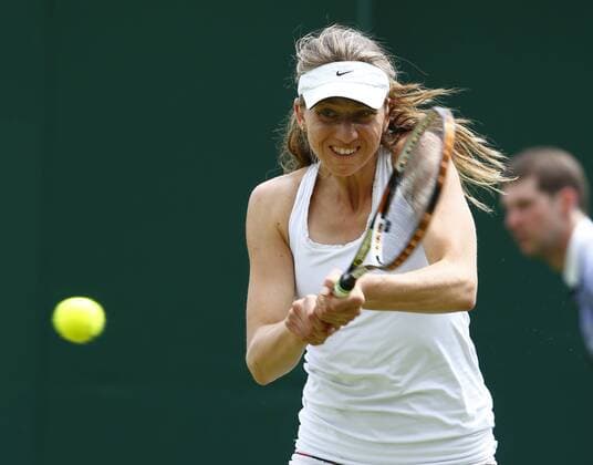 Wimbledon Championships 2013, AELTC,London, ITF Grand Slam Tennis Tournament, Mona Barthel (GER),Aktion,Einzelbild,Halbkoerper,Querformat,