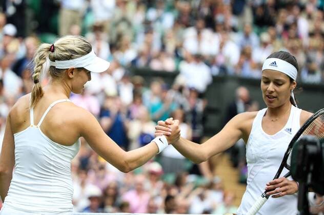 (130626) -- LONDON, June 26, 2013 (Xinhua) -- Eugenie Bouchard of Canada and Ana Ivanovic (R) of Serbia greet each other after their second round of ladies singles match on day 3 of the Wimbledon Lawn Tennis Championships at the All England Lawn Tennis Club in London, Britain on June 26, 2013. Ivanovic lost 0-2.(Xinhua Tang Shi) (SP)BRITAIN-LONDON-TENNIS-WIMBLEDON-DAY 3 
