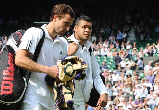Tennis - 2013 Wimbledon Championships - Mens Singles second Round Wilfried Tsonga against Emests Gulbis on Centre Court Wilfried Tsonga - France leaves the court after retiring injured 