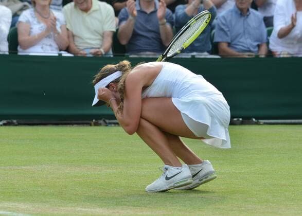 Tennis - 2013 Wimbledon Championships - Ladies Singles second Round on Court 2. Michelle Larcher de Brito - Portugal celebrates her victory 