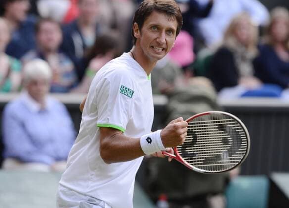 Tennis - 2013 Wimbledon Championships - Mens Singles Sergiy Stakhovsky on Centre Court Sergiy Stakhovsky - Ukraine 