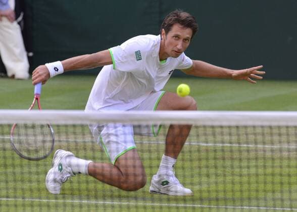 Tennis - 2013 Wimbledon Championships - Mens Singles Sergiy Stakhovsky on Centre Court Sergiy Stakhovsky - Ukraine 