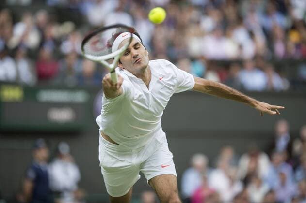 26.06.2013. The Wimbledon Tennis Championships 2013 held at The All England Lawn Tennis and Croquet Club, London, England, UK. Roger Federer (SUI) 3 (wearing bandana) on Centre Court. xDuncanxGrovex  ActionPlus26758