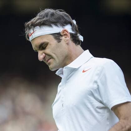 26.06.2013. The Wimbledon Tennis Championships 2013 held at The All England Lawn Tennis and Croquet Club, London, England, UK. Roger Federer (SUI) 3 (wearing bandana) on Centre Court. xDuncanxGrovex  ActionPlus26762