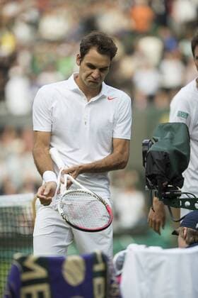 26.06.2013. The Wimbledon Tennis Championships 2013 held at The All England Lawn Tennis and Croquet Club, London, England, UK. Sergiy Stakhovsky (UKR) v Roger Federer (SUI) 3 on Centre Court. xDuncanxGrovex  ActionPlus26764