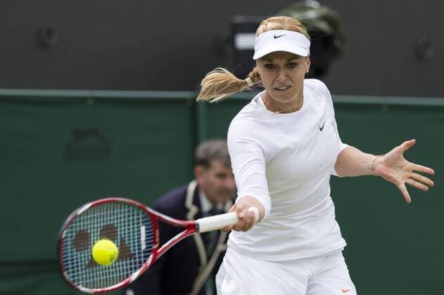 Tennis: Wimbledon Championship 2013, Germany s Sabine Lisicki returns during their second round women s singles match on day four of the 2013 Wimbledon Championships tennis tournament at the All England Club in Wimbledon, southwest London, on June 27, 2013. xKirstenxHolstx xHOCHxZWEIx