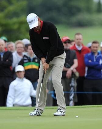 27.06.2013 Maynooth, Ireland. Padraig Harrington sinks a putt for a bogey on the 5th hole during the second round of the Irish Open from Carton House Golf Club xTommyxGrealyx  ActionPlus00000127779
