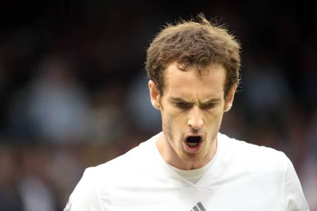 Great Britain s Andy Murray reacts after winning the second set in his match on day five of the 2013 Wimbledon Championships in London on June 28, 2013.  LON2013062828