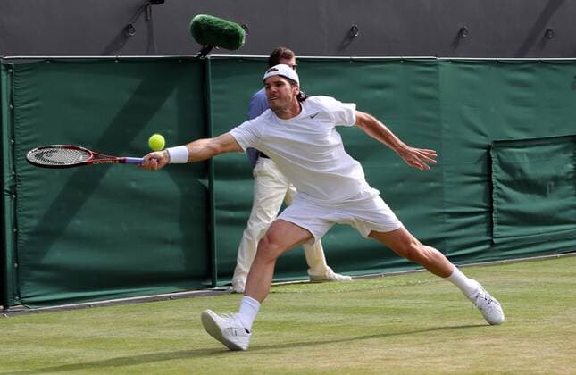 29.06.2013. Wimbledon, London, England. Day Six of the The Wimbledon Tennis Championships 2013 held at The All England Lawn Tennis and Croquet Club, London, England, UK. Tommy Haas ( GER) xKieranxGalvinx  ActionPlus11424454