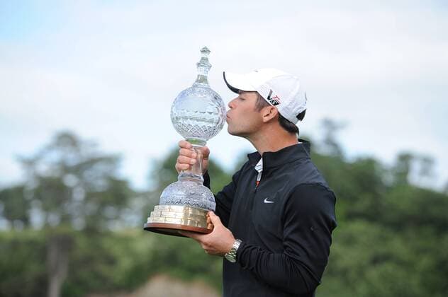 30.06.2013 Maynooth, Ireland. Paul Casey kisses the trophy after his win in the 2013 Irish Open from Carton House Golf Club xTommyxGrealyx  ActionPlus131009